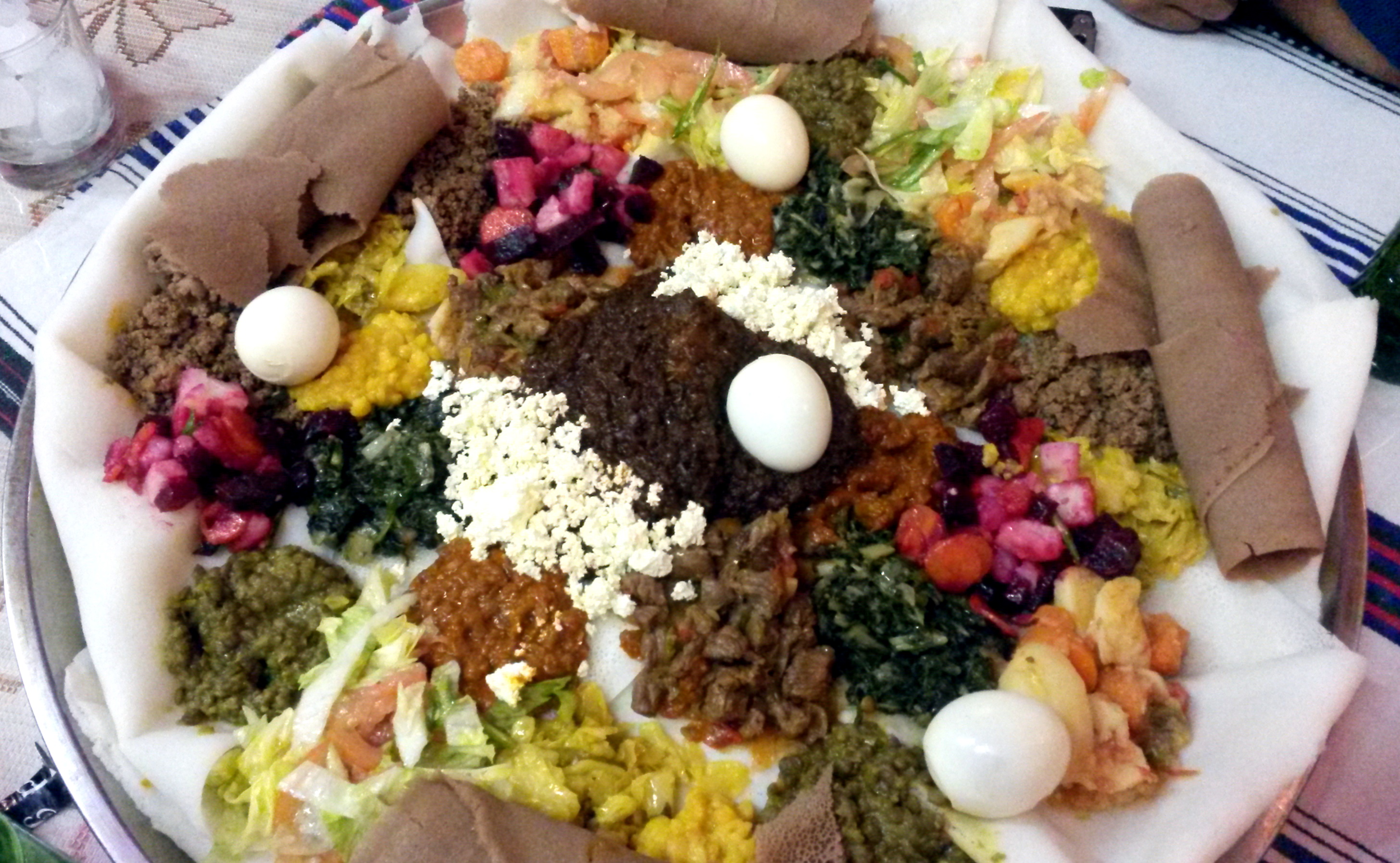 Mahberawi communal feast served on fresh injera